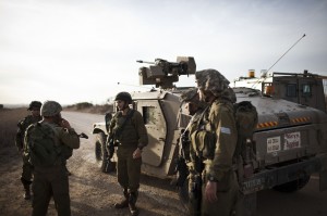 Israeli Tanks Gather on Gaza Border as Air Strikes Intensify